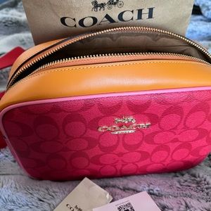 Brand New Cross body Coach purse Authentic.